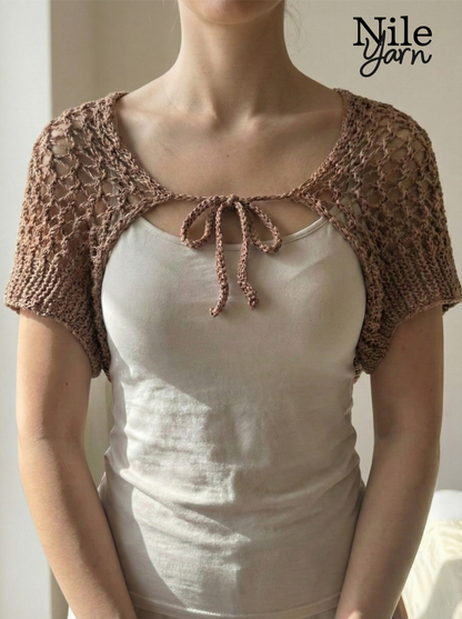 A women wearing Nile yarn shrug in  mocha mousse color 